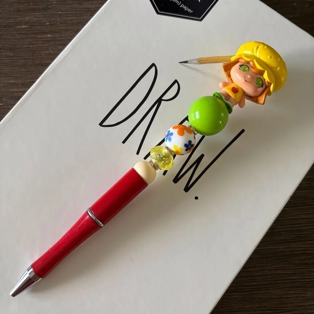 Strawberry Shortcake: Apple Dumplin’ handmade beaded pen